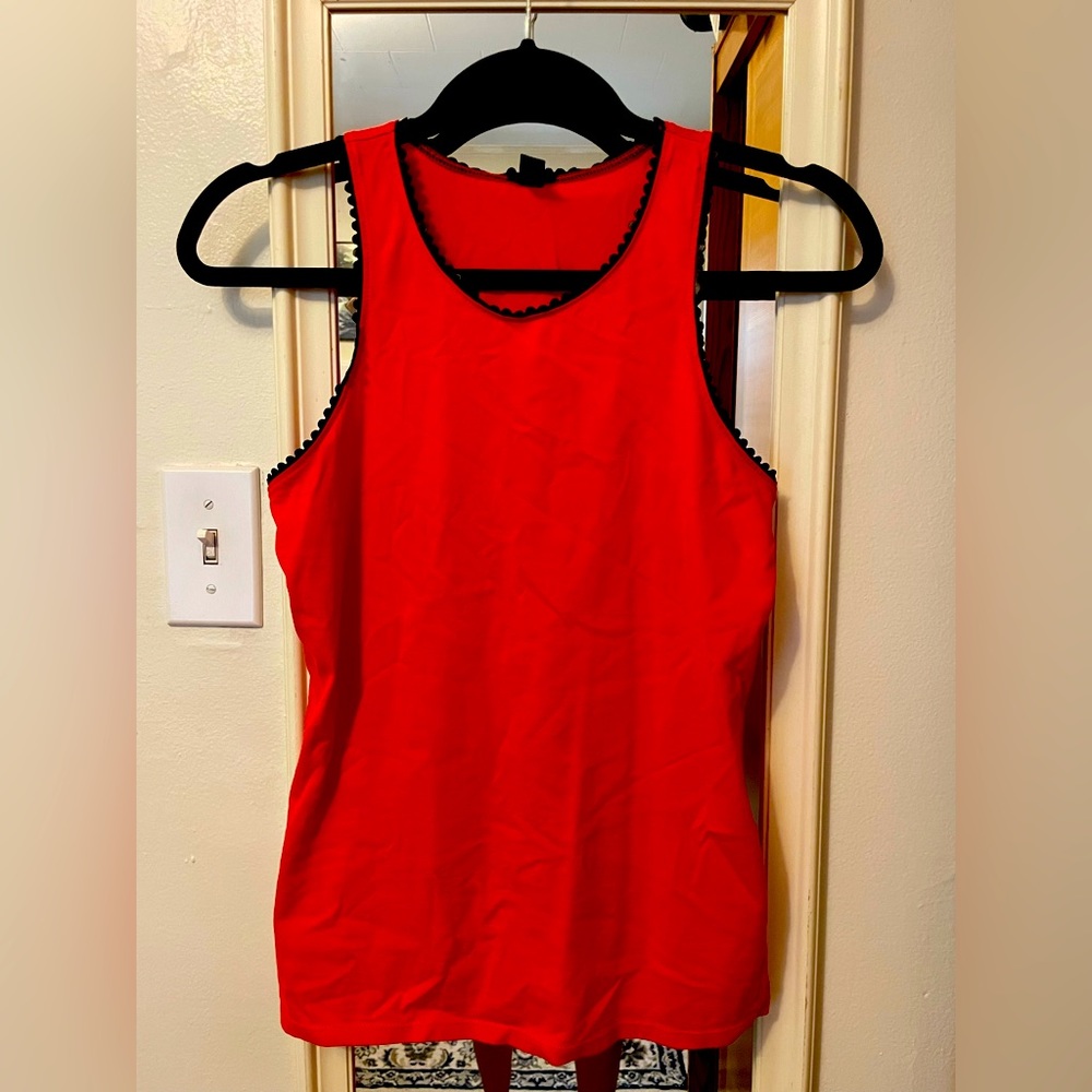 Red tank top from J Crew with black faux leather scalloped detail